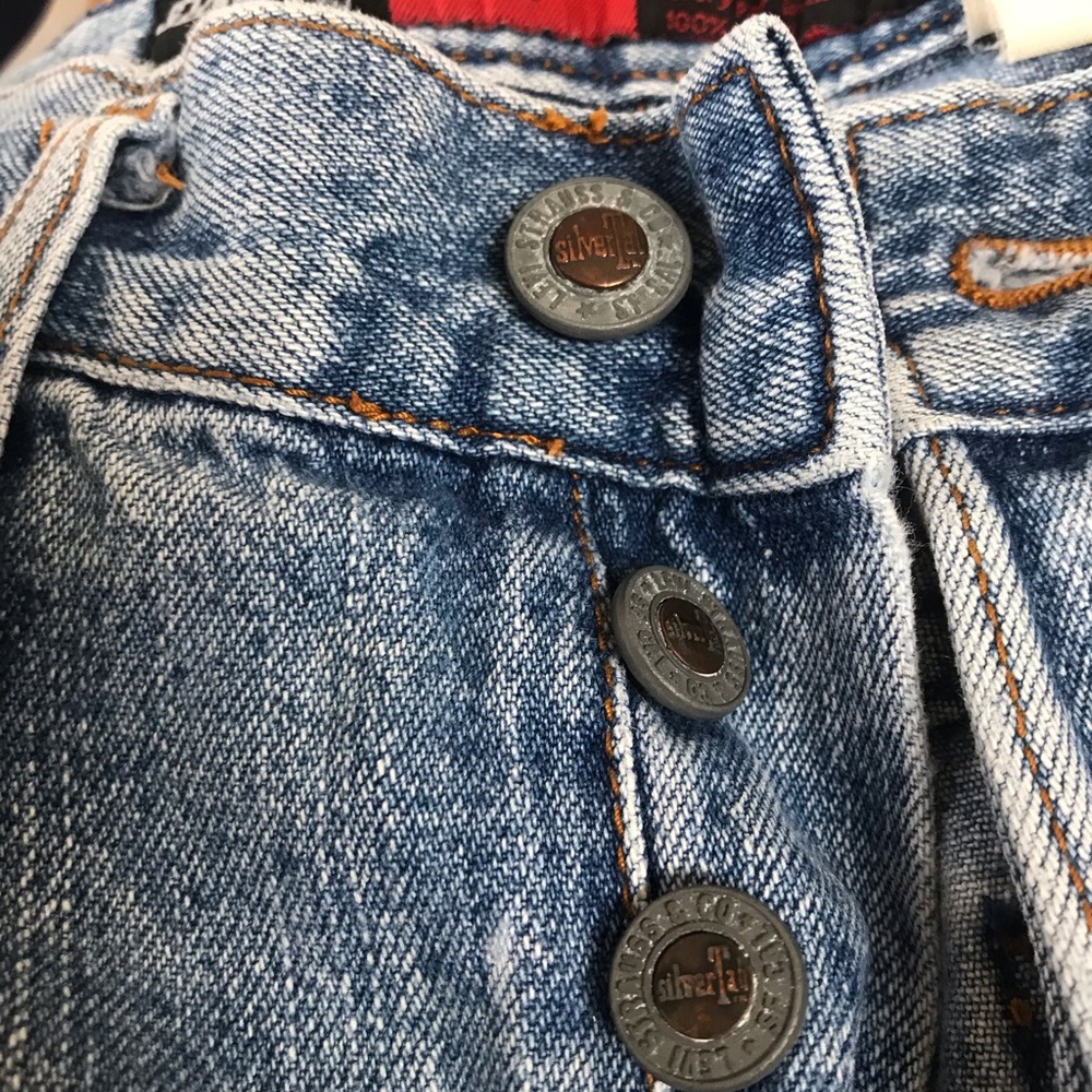 Vintage silver tan levies